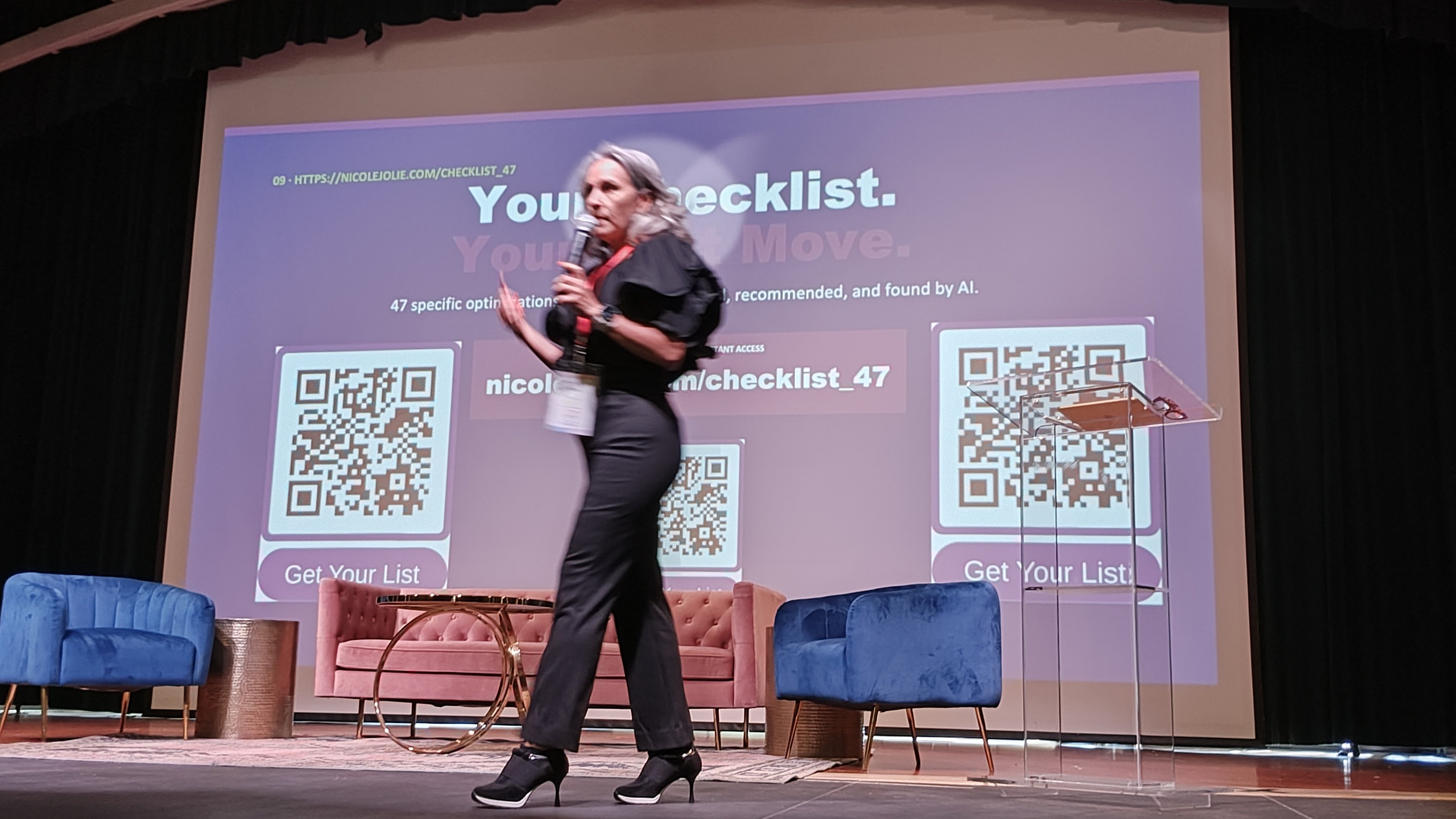 Nicole Jolie speaking on stage